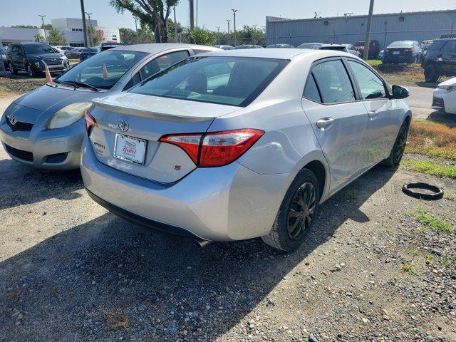 Photo of 2015 Classic Silver Metallic Toyota Corolla