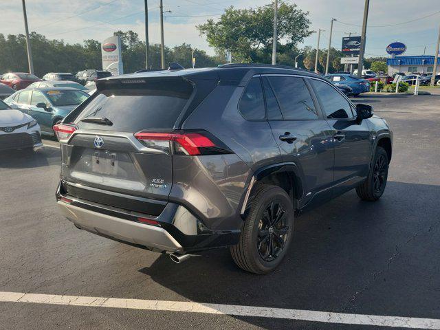 Photo of 2023 Magnetic Gray Metallic/Midnight Black Metallic Toyota RAV4 Hybrid