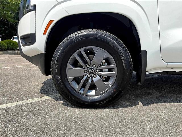 Photo of 2025 Glacier White Nissan Frontier