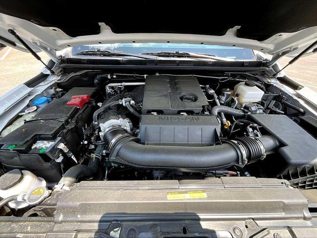 Photo of 2025 Glacier White Nissan Frontier