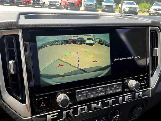 Photo of 2025 Glacier White Nissan Frontier
