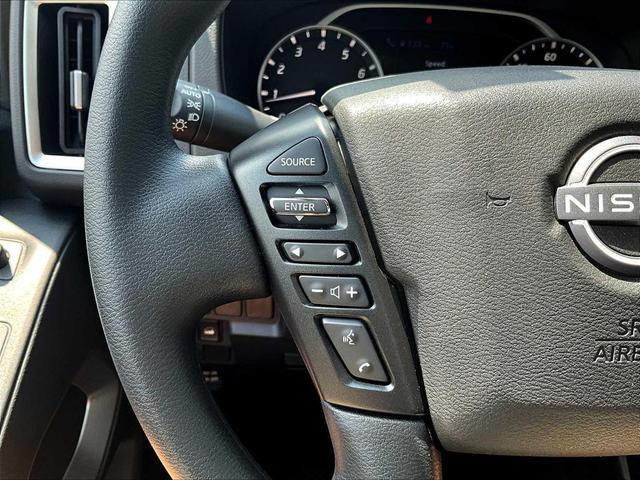 Photo of 2025 Glacier White Nissan Frontier