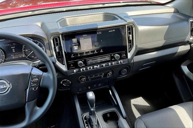Photo of 2025 Cardinal Red Metallic Tricoat Nissan Frontier