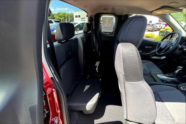 Photo of 2025 Cardinal Red Metallic Tricoat Nissan Frontier