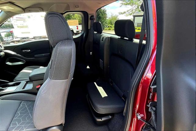 Photo of 2025 Cardinal Red Metallic Tricoat Nissan Frontier