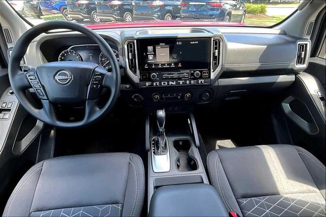 Photo of 2025 Cardinal Red Metallic Tricoat Nissan Frontier