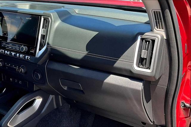 Photo of 2025 Cardinal Red Metallic Tricoat Nissan Frontier