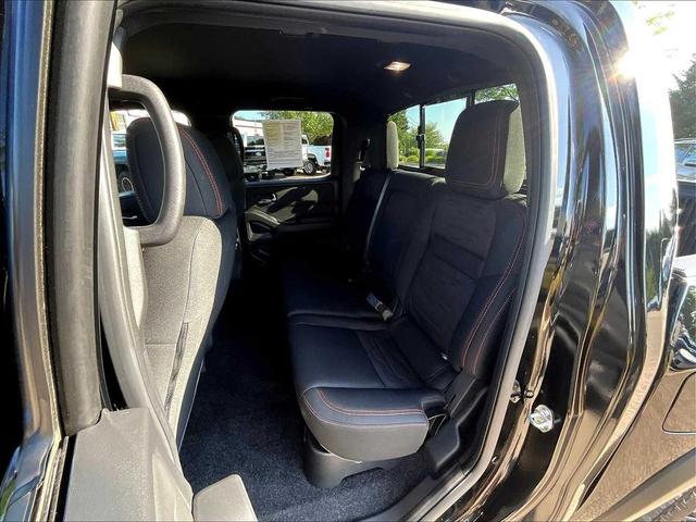 Photo of 2024 Super Black Nissan Frontier