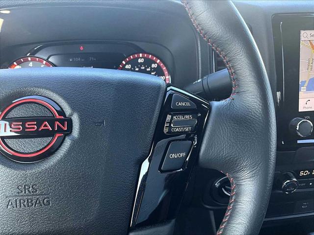 Photo of 2024 Super Black Nissan Frontier