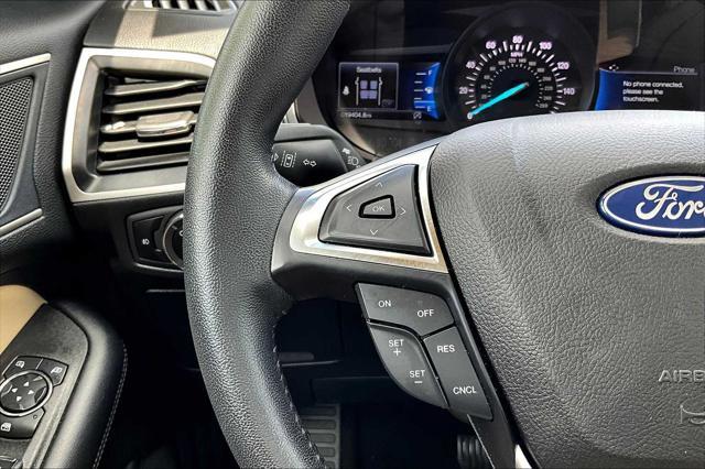 Photo of 2023 Agate Black Metallic Ford Edge