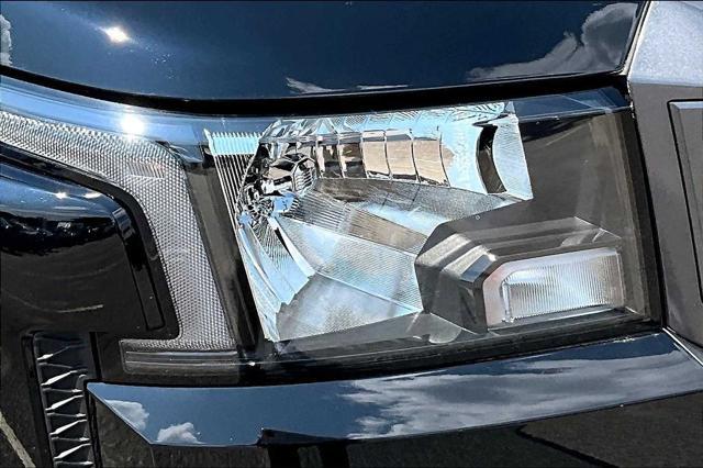 Photo of 2025 Super Black Nissan Frontier