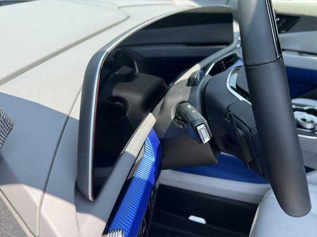Photo of 2025 Radiant Red Tintcoat Cadillac OPTIQ