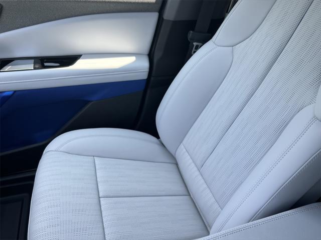 Photo of 2025 Radiant Red Tintcoat Cadillac OPTIQ