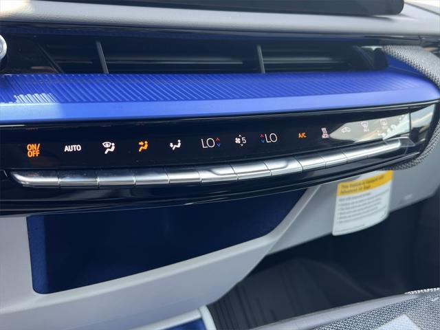 Photo of 2025 Radiant Red Tintcoat Cadillac OPTIQ