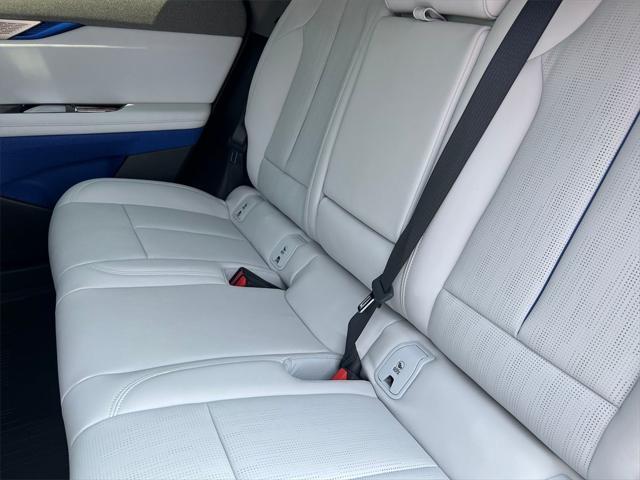Photo of 2025 Radiant Red Tintcoat Cadillac OPTIQ