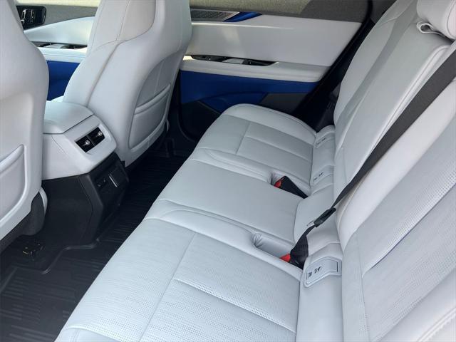 Photo of 2025 Radiant Red Tintcoat Cadillac OPTIQ