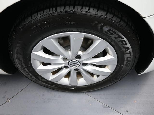 Photo of 2015 Pure White Volkswagen Beetle
