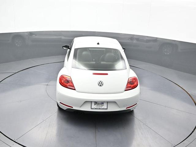 Photo of 2015 Pure White Volkswagen Beetle