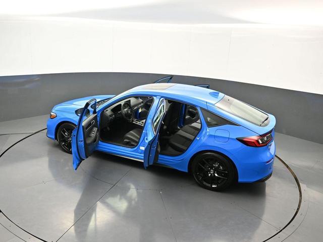 Photo of 2025 Boost Blue Pearl Honda Civic Hybrid