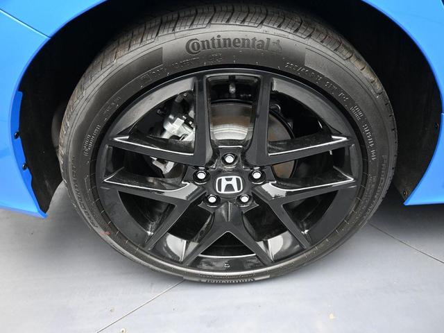 Photo of 2025 Boost Blue Pearl Honda Civic Hybrid