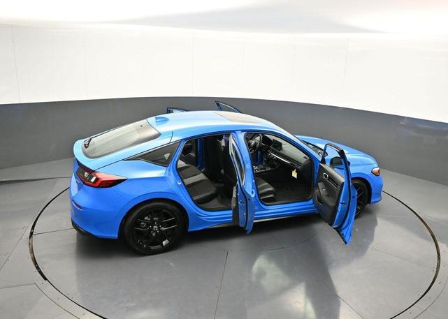 Photo of 2025 Boost Blue Pearl Honda Civic Hybrid