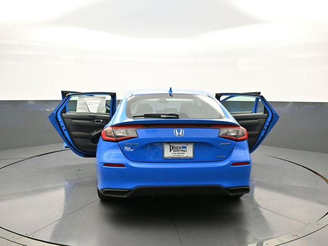 Photo of 2025 Boost Blue Pearl Honda Civic Hybrid