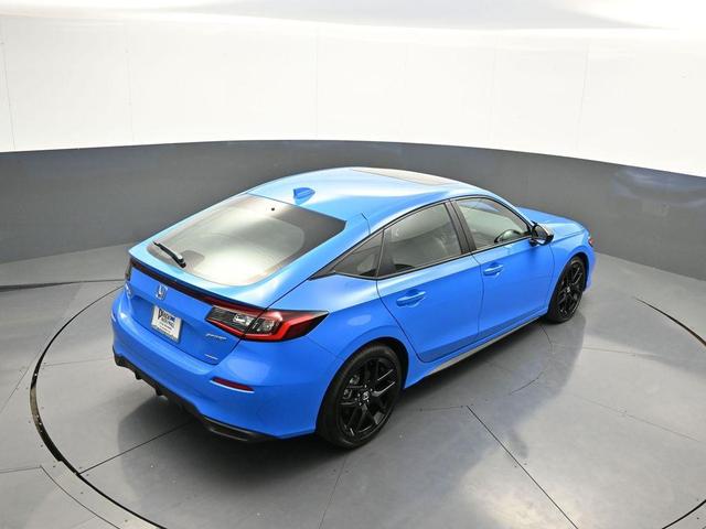 Photo of 2025 Boost Blue Pearl Honda Civic Hybrid