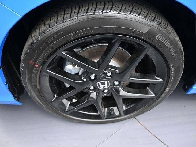 Photo of 2025 Boost Blue Pearl Honda Civic Hybrid