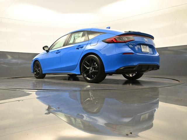 Photo of 2025 Boost Blue Pearl Honda Civic Hybrid