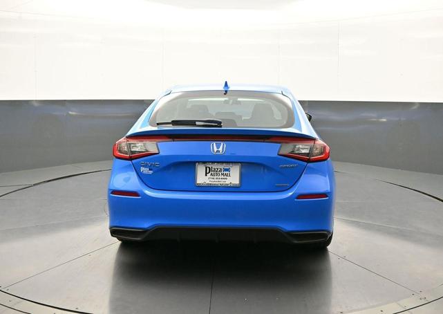 Photo of 2025 Boost Blue Pearl Honda Civic Hybrid