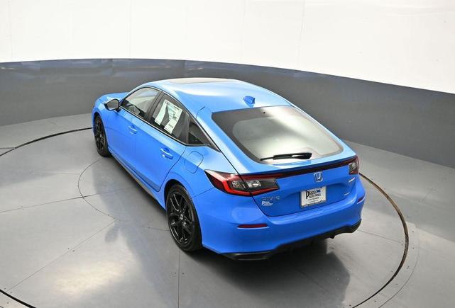 Photo of 2025 Boost Blue Pearl Honda Civic Hybrid