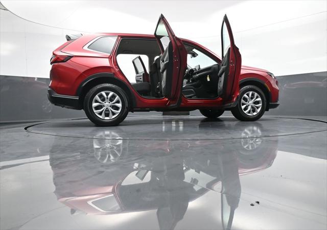 Photo of 2025 Radiant Red Metallic Honda CR-V