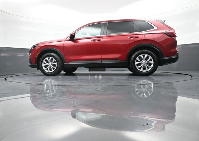 Photo of 2025 Radiant Red Metallic Honda CR-V