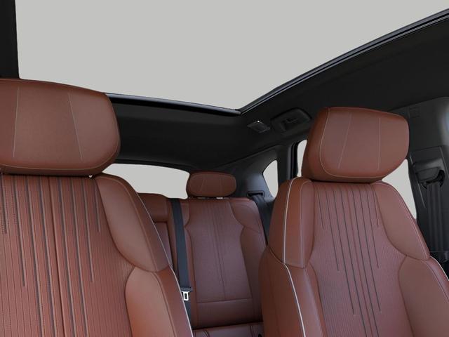 Photo of 2025 Crystal White Tricoat Cadillac OPTIQ