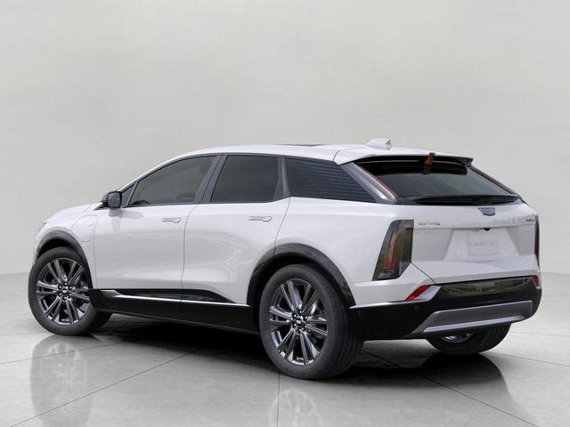 Photo of 2025 Crystal White Tricoat Cadillac OPTIQ