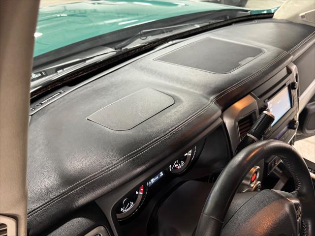 Photo of 2016 GREEN / BEIGE 2TONE Nissan Titan XD