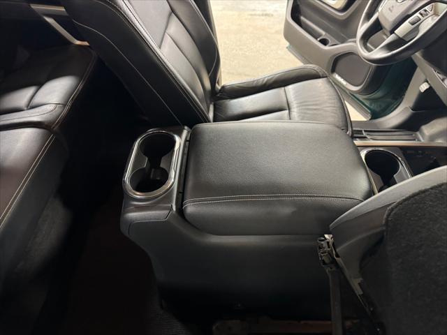 Photo of 2016 GREEN / BEIGE 2TONE Nissan Titan XD
