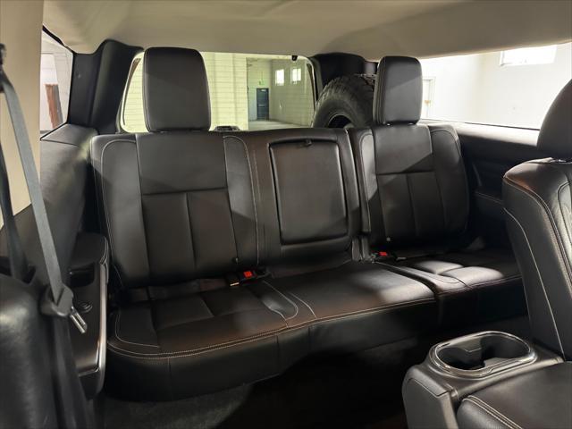 Photo of 2016 GREEN / BEIGE 2TONE Nissan Titan XD