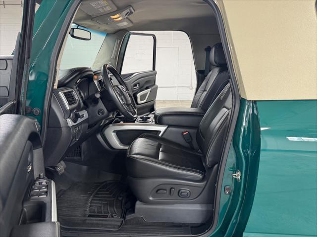 Photo of 2016 GREEN / BEIGE 2TONE Nissan Titan XD