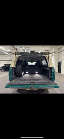Photo of 2016 GREEN / BEIGE 2TONE Nissan Titan XD