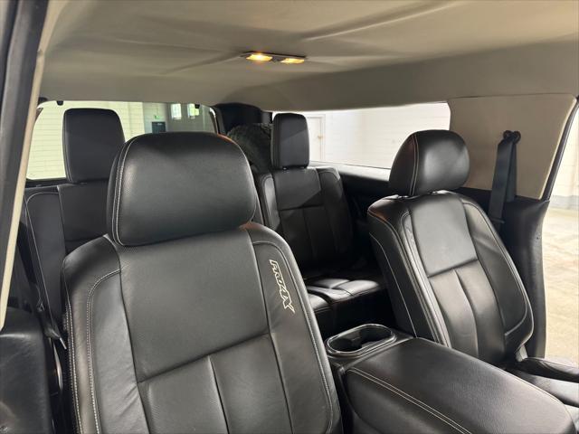 Photo of 2016 GREEN / BEIGE 2TONE Nissan Titan XD
