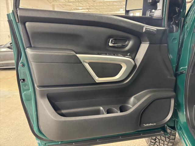 Photo of 2016 GREEN / BEIGE 2TONE Nissan Titan XD