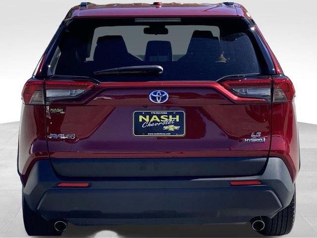 Photo of 2023 Ruby Flare Pearl Toyota RAV4 Hybrid
