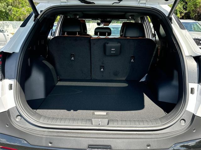 Photo of 2026 White Pearl Kia Sportage