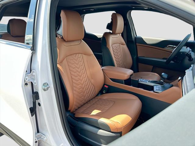 Photo of 2026 White Pearl Kia Sportage