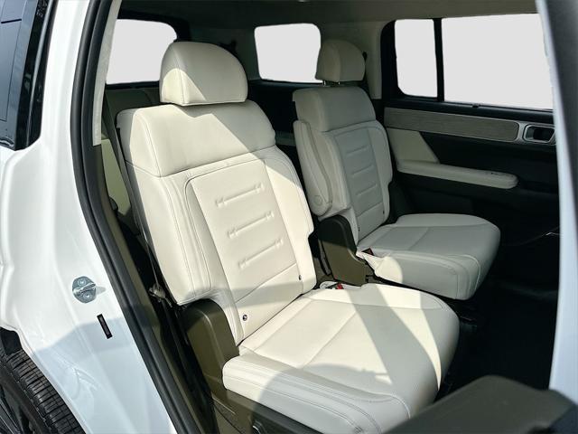 Photo of 2025 Serenity White Hyundai SANTA FE HEV