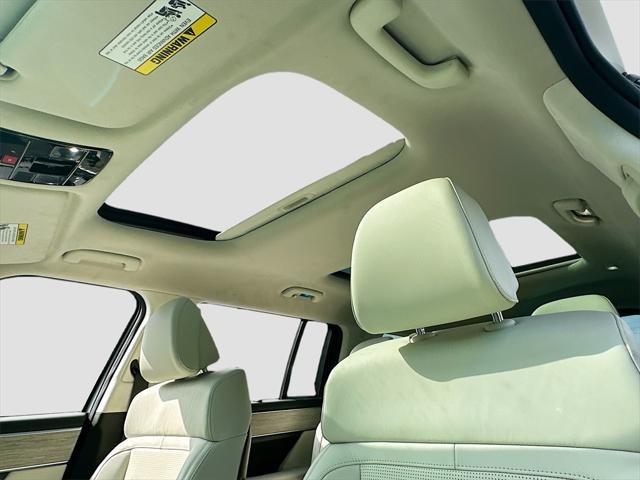 Photo of 2025 Serenity White Hyundai SANTA FE HEV