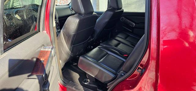 Photo of 2009 Sangria Red Clearcoat Metalic/Pueblo Gold Ford Explorer