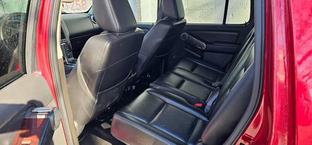 Photo of 2009 Sangria Red Clearcoat Metalic/Pueblo Gold Ford Explorer