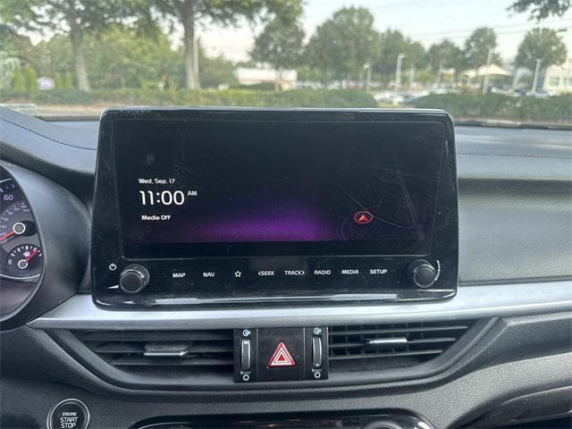 Photo of 2023 Fire Orange Kia Forte